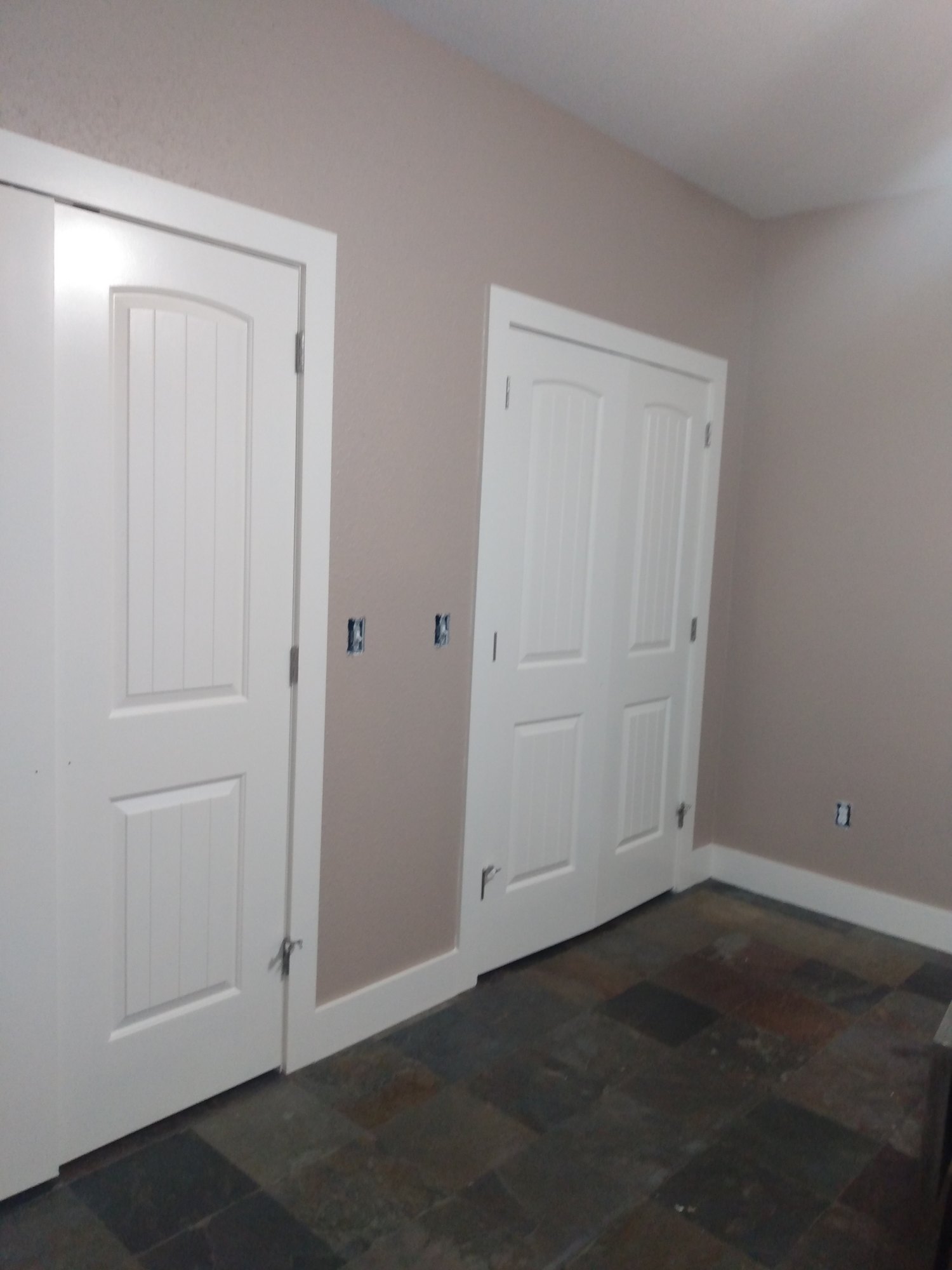 Interior doors repainted white with warm taupe walls