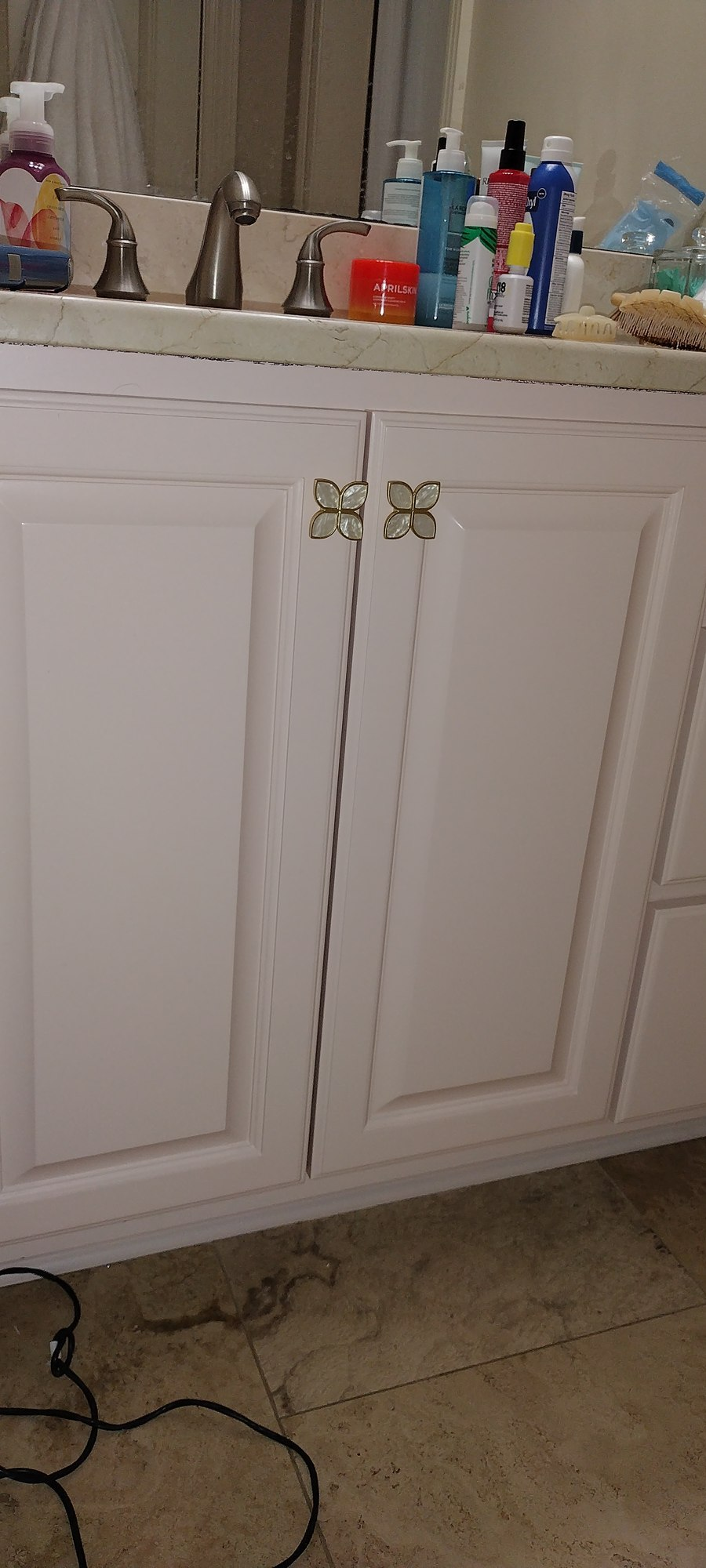 Freshly painted white bathroom vanity