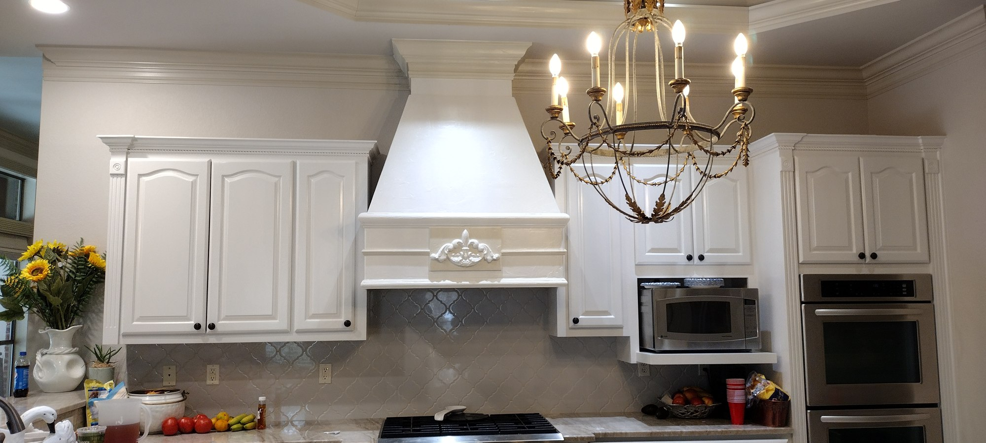 Freshly painted white kitchen cabinets