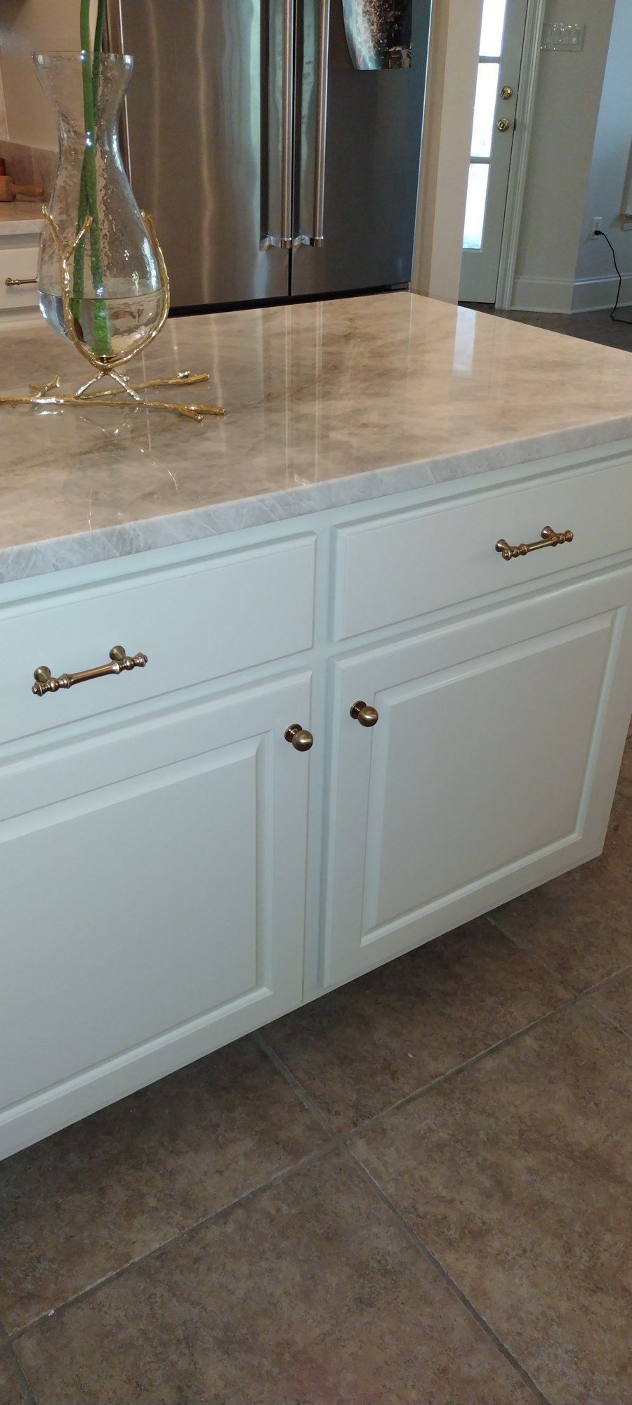 Close-up of painted cabinet drawer hardware